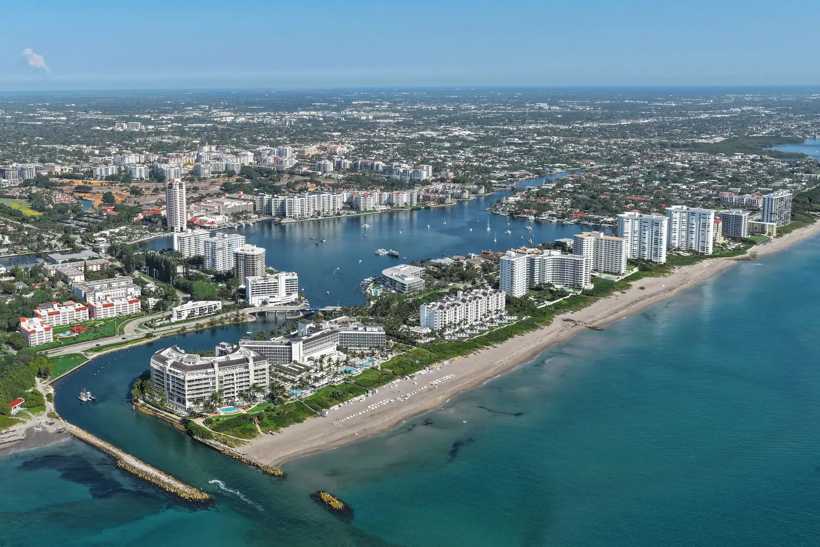 Aerial view of the Boca Raton Inlet, the beach and the city behind it